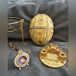 Faberge. Yellow engine turned guilloche enameled 'Gatchina Palace' egg